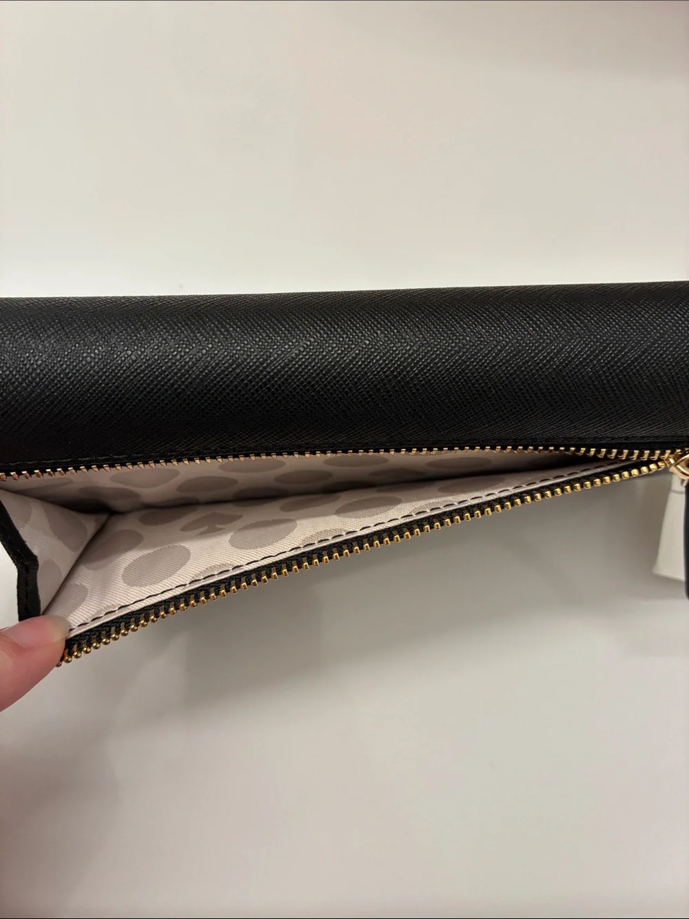 kate spade Black Saffiano Fold-Over Wallet with Gold Logo